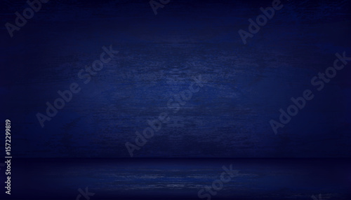 Blue background,Studio room with with light,shadow on cement wall grunge texture and rough surface concrete floor dark blue,Abstract Backdrop grainy textured  brushed surface
