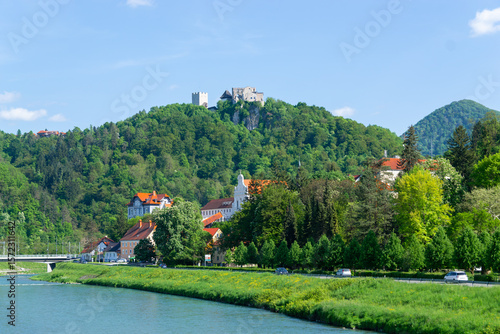Fényképezés Scenic view of a Slovenian town Celje with river and green hills