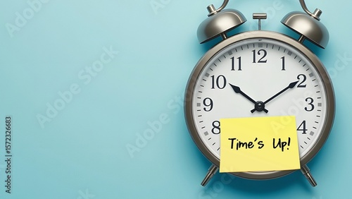 Clock on blue copy space blue background with stick note written TIME'S UP,  time running out , take action before missing due date or deadline, work or decision making must be done