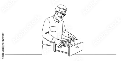 man organizing documents in office drawer