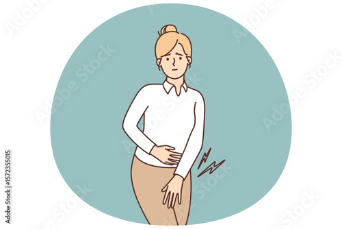 Unhappy girl painfully presses palm to perineum during menstruation or bladder problems