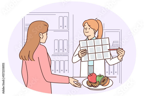 Woman receives advice from nutritionist on nutrition and diet to lose weight or improve health