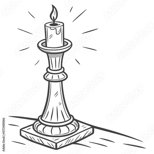 Ornate candlestick with burning candle flame light