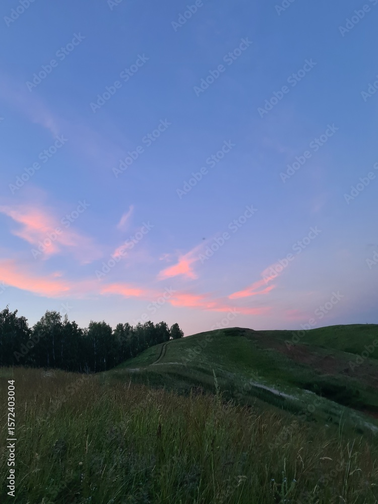Obraz premium sunset in the mountains in summer