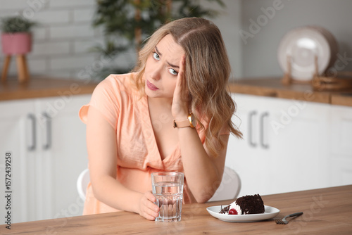 Young pregnant woman with w...