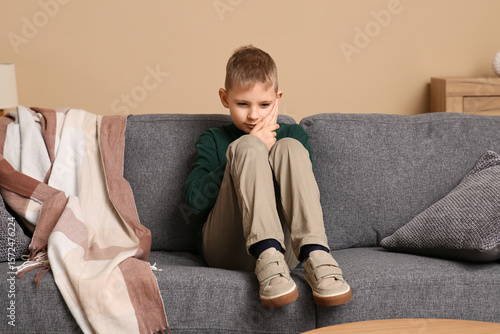 Little boy suffering from t...