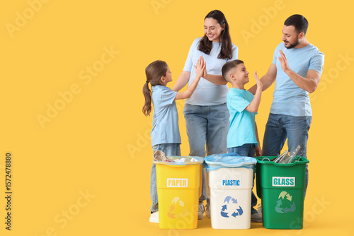 Family with garbage contain...
