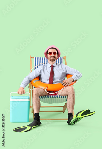 Young businessman in deck c...