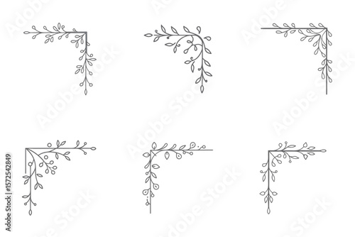 A set of six subtle floral corner embellishments in dusty graphite for printed pages