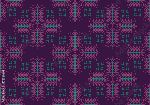 A vibrant textile pattern composed of pink, green, and teal geometric shapes on a deep purple base. The structured pixel design repeats evenly, evoking cultural and festive influences.