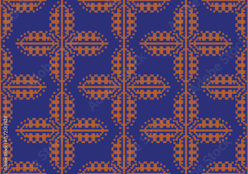 This pattern features symmetrical light orange pixel motifs on a rich deep blue background. The layout resembles stylized glyphs or symbols, offering a traditional aesthetic with a modern twist.