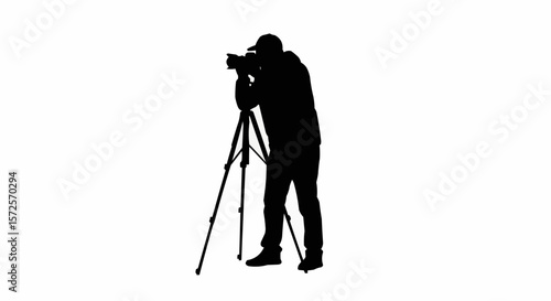 Silhouette of Photographer with Tripod Taking Photos on White Background