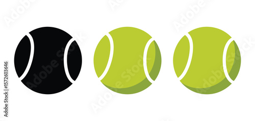  Three tennis balls one black two green on white background