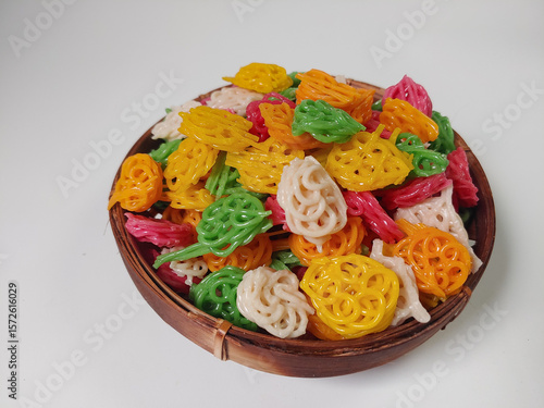 Kerupuk bunga or kerupuk mawar or flower cracker or rose cracker are typically deep-fried until crispy and are often served as a snack or a side dish in Indonesia.