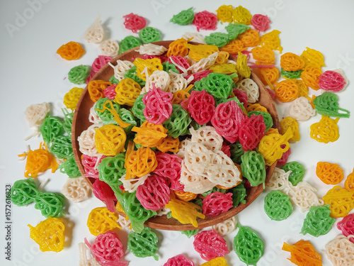 Kerupuk bunga or kerupuk mawar or flower cracker or rose cracker are typically deep-fried until crispy and are often served as a snack or a side dish in Indonesia.