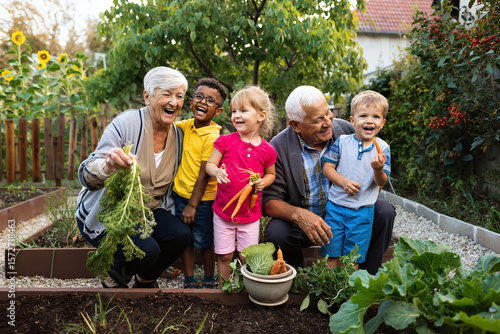 family grows vegetables in the garden