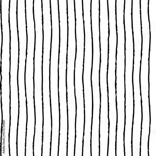 Vertical striped seamless pattern with hand drawn pencil textured thin lines....