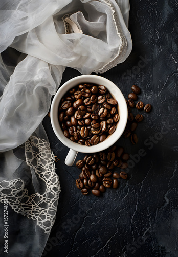 coffee beans in a cup on wooden background