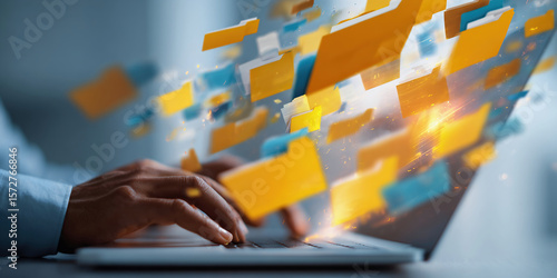 Document management system DMS and automated classification technology. Text documents and folder icons. Businessman using laptop computer for tagging and retrieving digital documents.