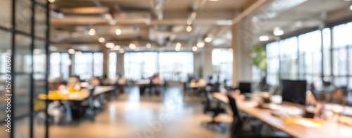Blurred image of modern office space Modern office space with bright working environment.