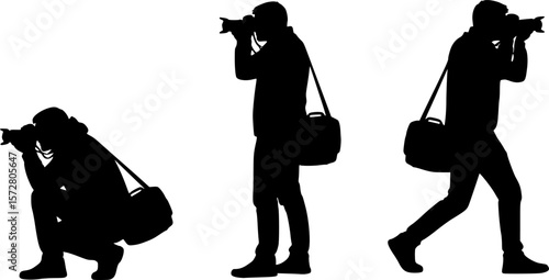 Silhouettes of photographers in various poses taking pictures with cameras in a black and white image 