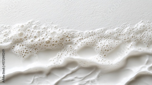 Gentle Foaming Cleanser: A Luxurious White Cream Texture with Bubbles