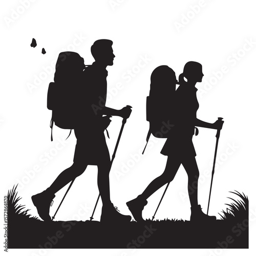 A silhouette of a couple hiking through nature, showcasing their adventurous spirit
