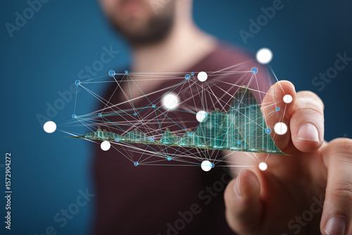 Принти на полотні Close-up of a person interacting with a holographic representation of a data network and graph