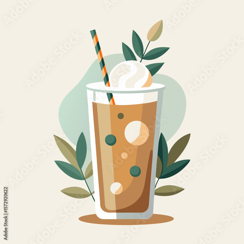 A glass of coffee with a straw and a leaf on the side. The leaf is green and the coffee is brown