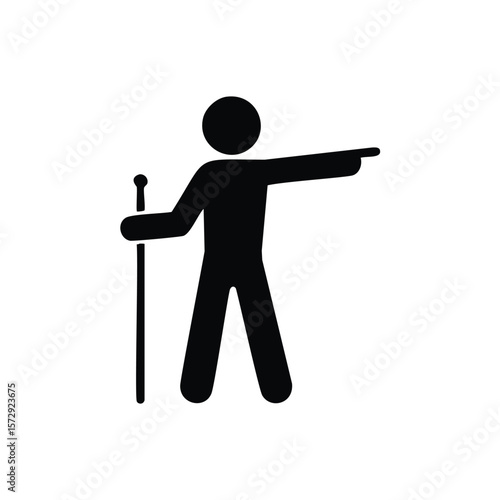 Black silhouette of a person with a walking stick pointing direction