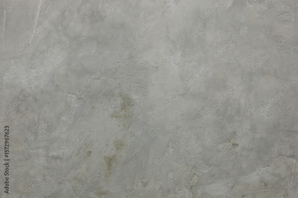 Naklejka premium Gray walls that look wet after rain are good for the background