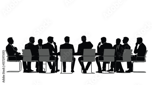 Silhouette of business professionals in a meeting around a table with laptops