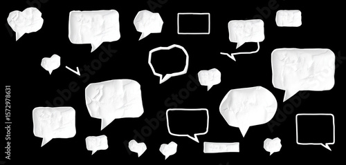 Set of empty, textured speech bubbles on a black background. Ideal for illustrating dialogues, thoughts, questions and answers. Concept of communication, chat and exchange of ideas