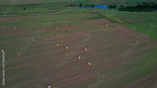 Aerial shot of hay bales in field in Kansas