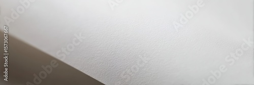 White watercolor paper texture background with subtle grain and soft surface ideal for artistic design template illustration mockup painting sketch or craft project high resolution closeup surface