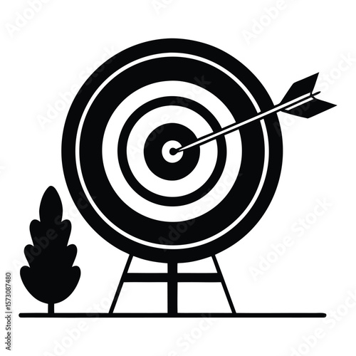 Simple silhouette of an arrow hitting the bullseye of a target representing success and precision