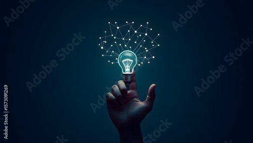 hand holding light bulb