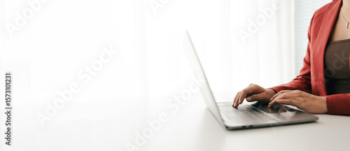 Close-up portrait typing keyboard on laptop computer. Working online on white table at office. Facebook chat. Website meeting. Blogger. Journalist writing articles. online job ideas