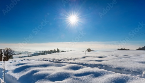 Wallpaper Mural sun on blue sky over snow covered pastures Torontodigital.ca