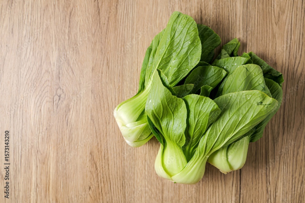Fototapeta premium Green Pakchoi,Pak Choi,Bok Choy on wooden background