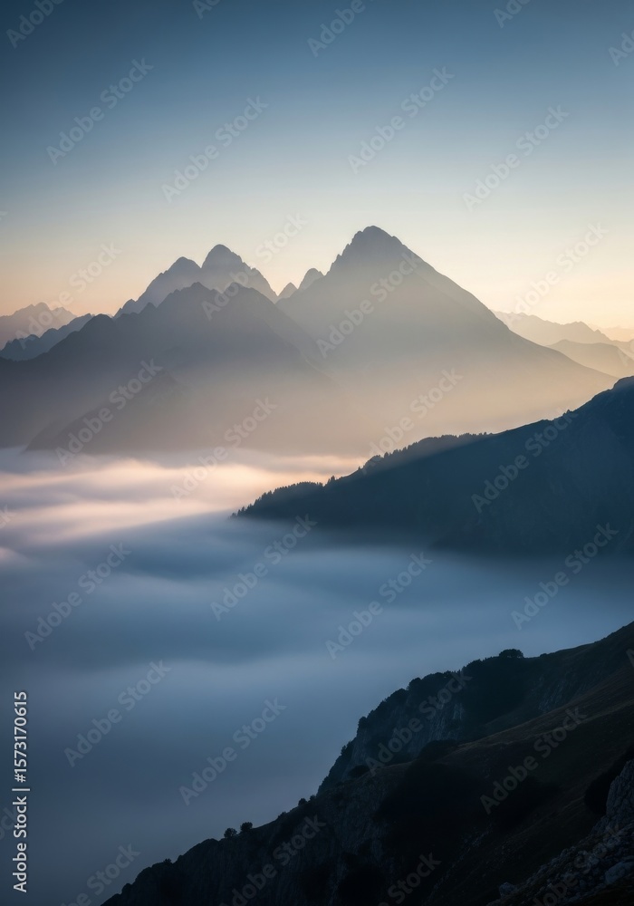 Obraz premium Serenity of Misty Peaks - Peaceful mountain landscape, sunrise mist, ethereal beauty, tranquil scene, nature's serenity