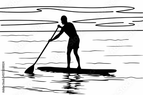 Silhouette of person paddleboarding on water ocean