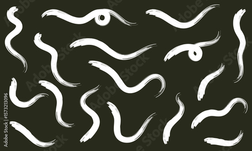Brush line stroke squiggly paint set on chalkboard. Hand drawn doodle swirl wave brush curly charcoal stroke. Line squiggly paint curly hand drawn ink calligraphy elements. Vector illustration. 