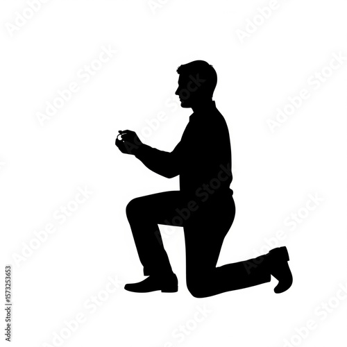 Silhouette of Man Proposing with Ring