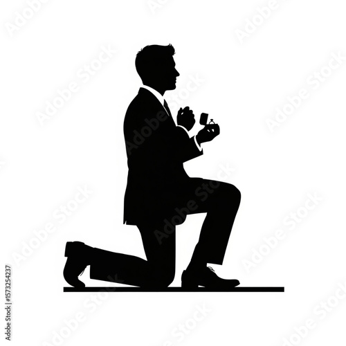 Silhouette of a Man Proposing with a Ring
