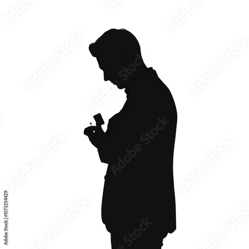 Silhouette of Man Proposing with Ring