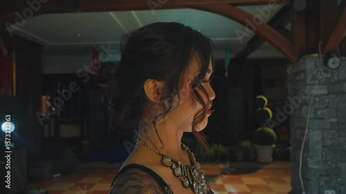 Elegant Woman in Profile with Statement Necklace