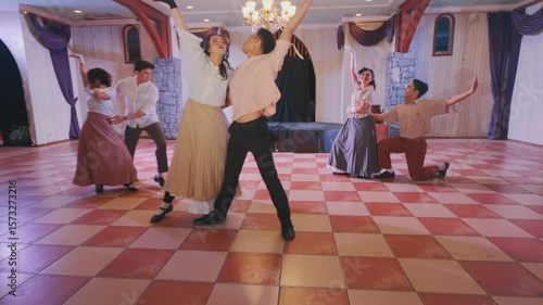 Joyful Dance Performance in Rustic Hall