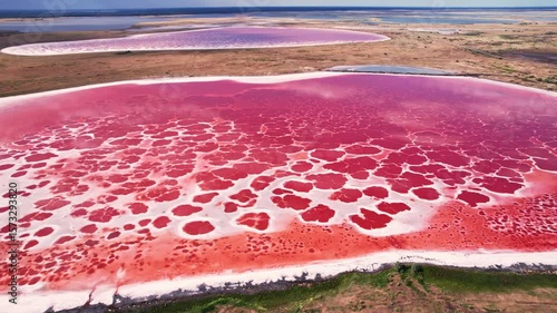 Experience the breathtaking aerial view of the stunning pink salt lake landscape