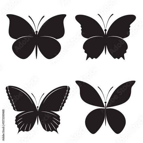Four black butterfly silhouettes insect wings